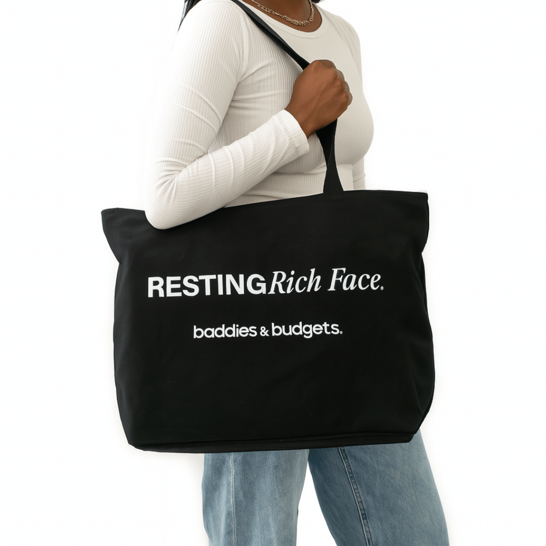 Black woman wearing gold jewelry and holding a bold statement canvas tote from Baddies & Budgets