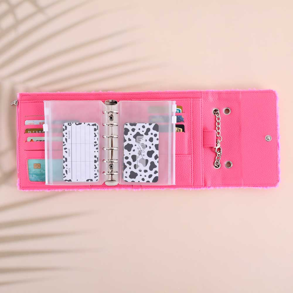 Open interior of the A6 hot pink teddy trifold wallet showing 6-ring binder, card slots, zipper pouch, and budgeting inserts for cash stuffing