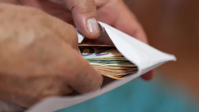 This Woman Was Drowning in Debt Before She Tried 'Cash Stuffing.' Now She's Made The Highly Effective Practice a Full-Time Business.