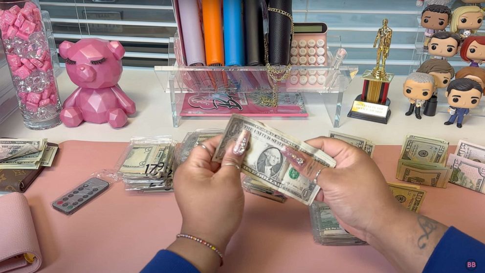 TikToker uses cash stuffing method to pay off debt and launch business