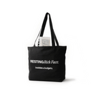 black canvas tote that reads “RESTING Rich Face.” from Baddies & Budgets